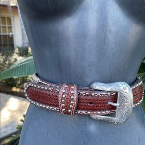 tooled leather engraved silver calf hair belt with silver studs and churros